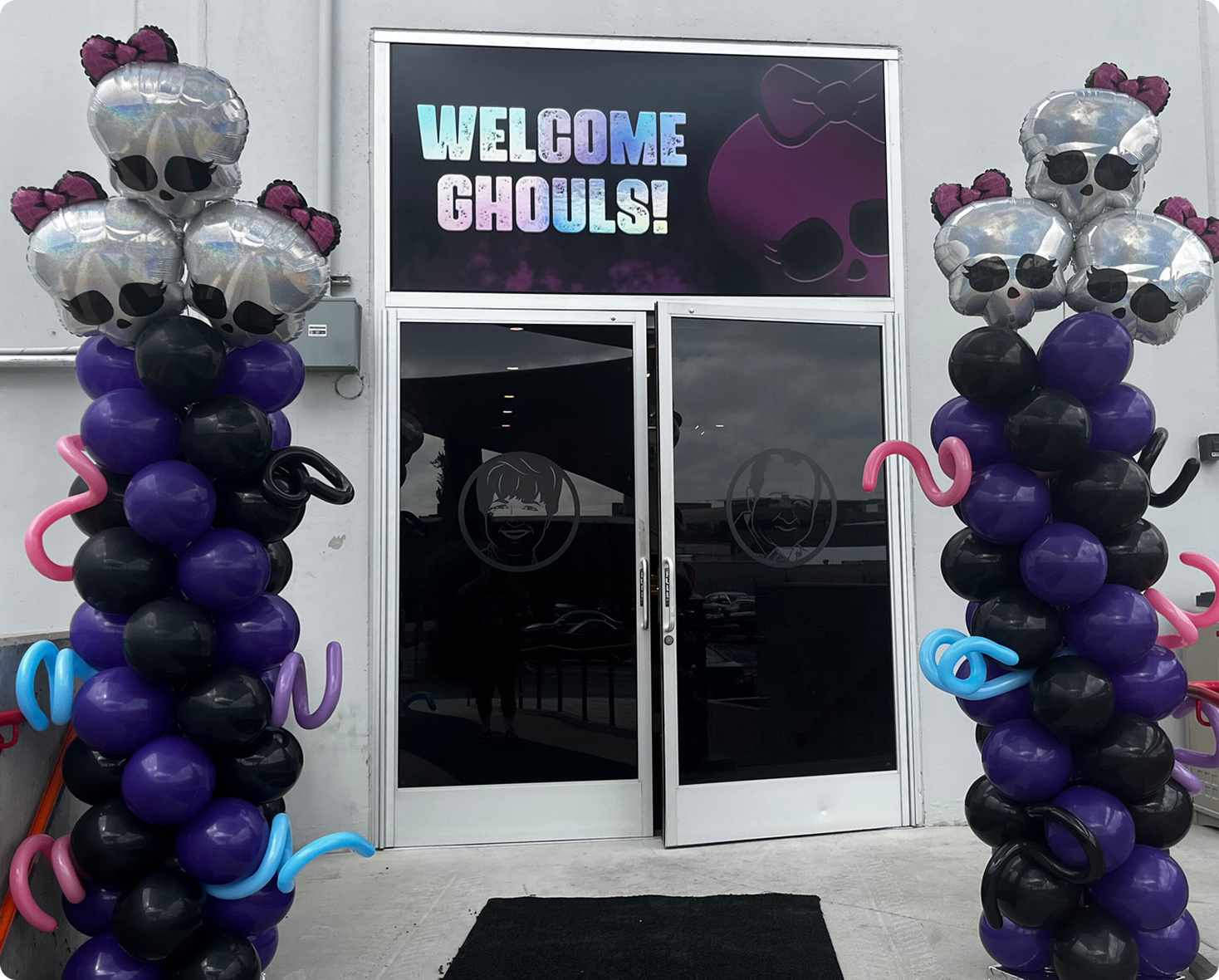 Welcome Ghouls sign with balloons