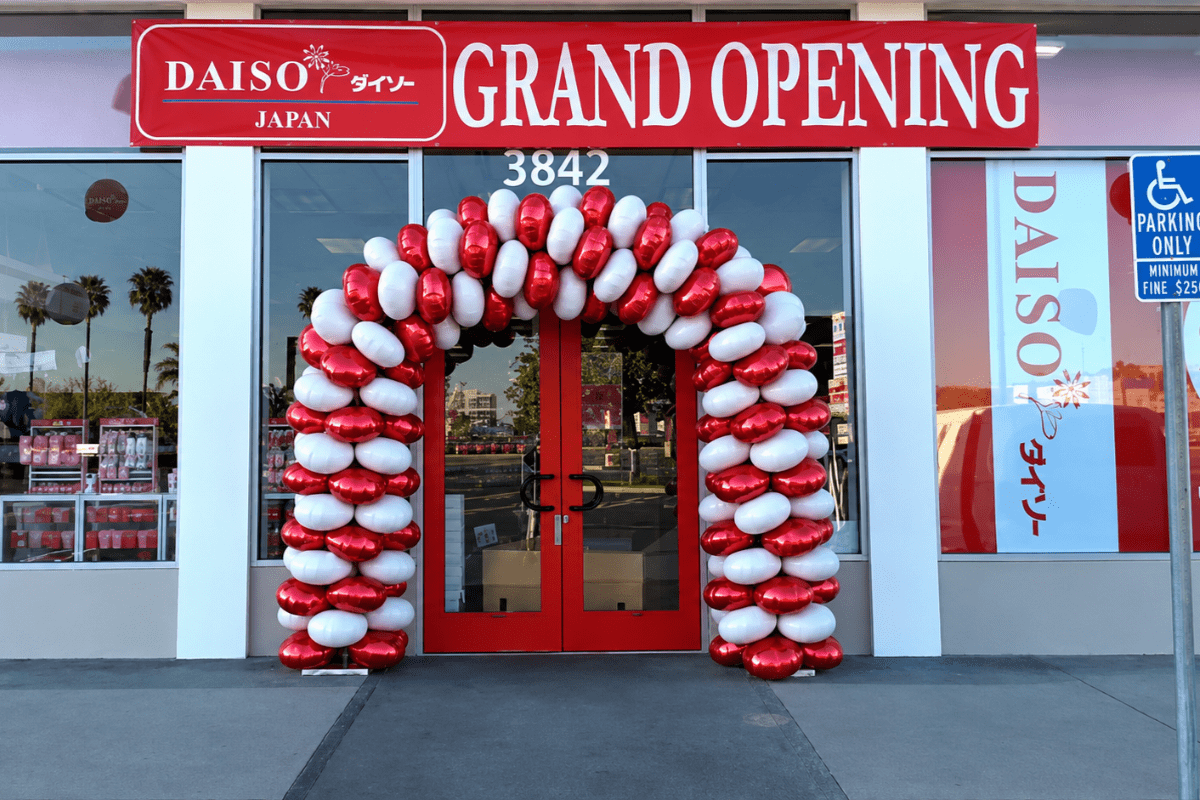 Daiso grand opening with red white balloons