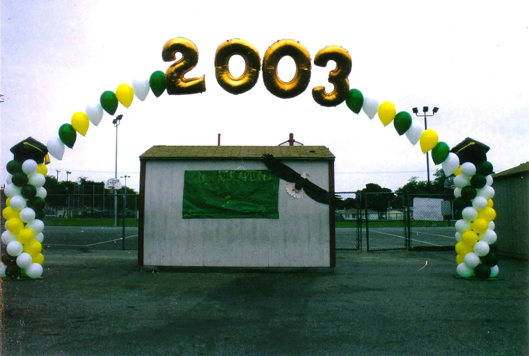 2003 balloon arch at outdoor graduation