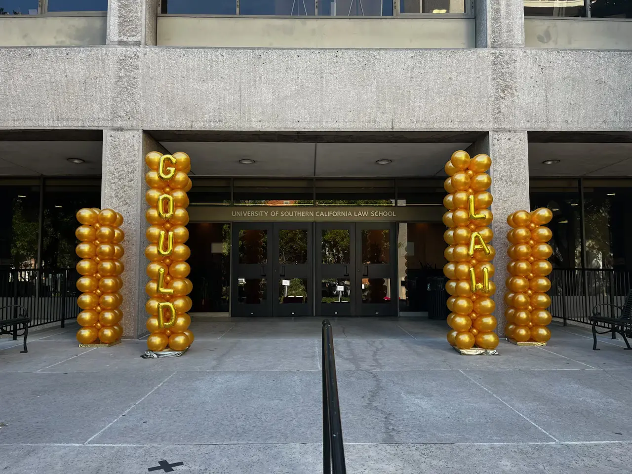 USC law school entrance with gold balloons