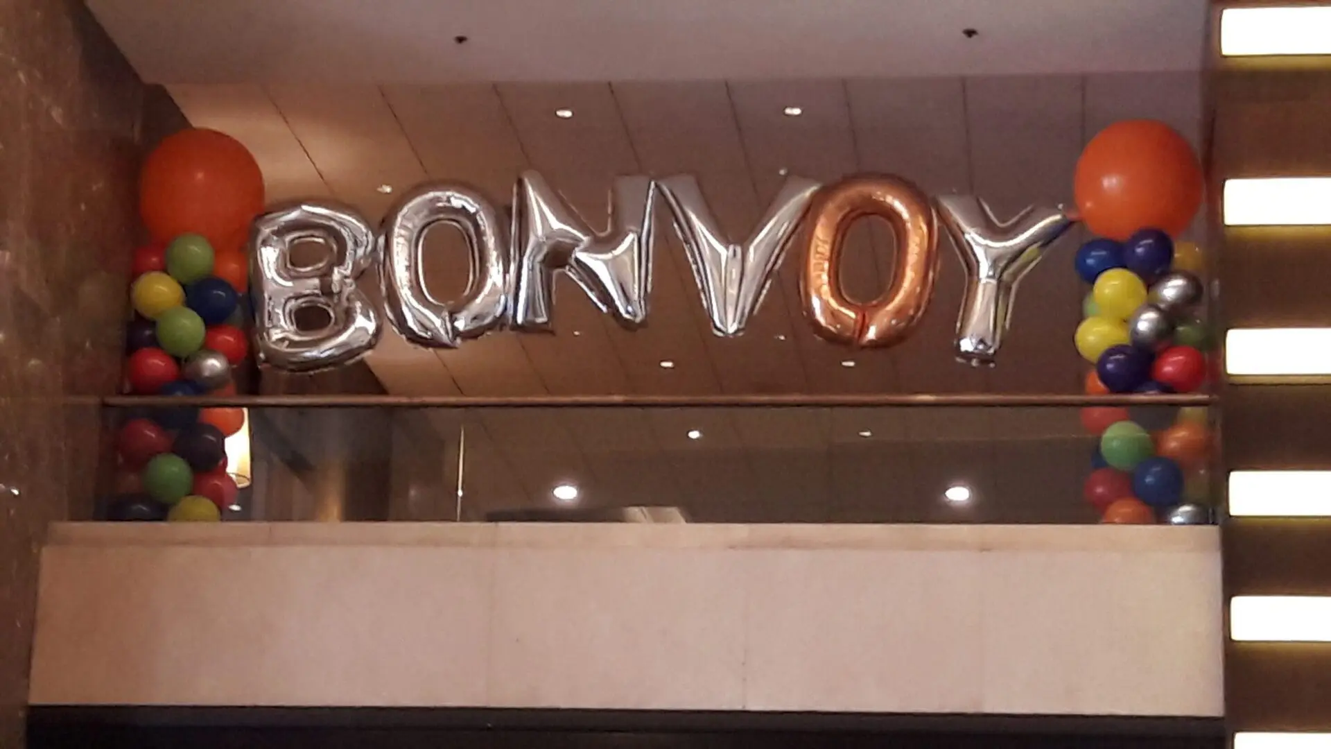 Silver BONVOY balloon display with colorful columns