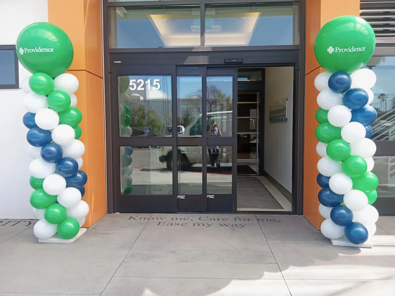 Providence entrance with green and blue balloons