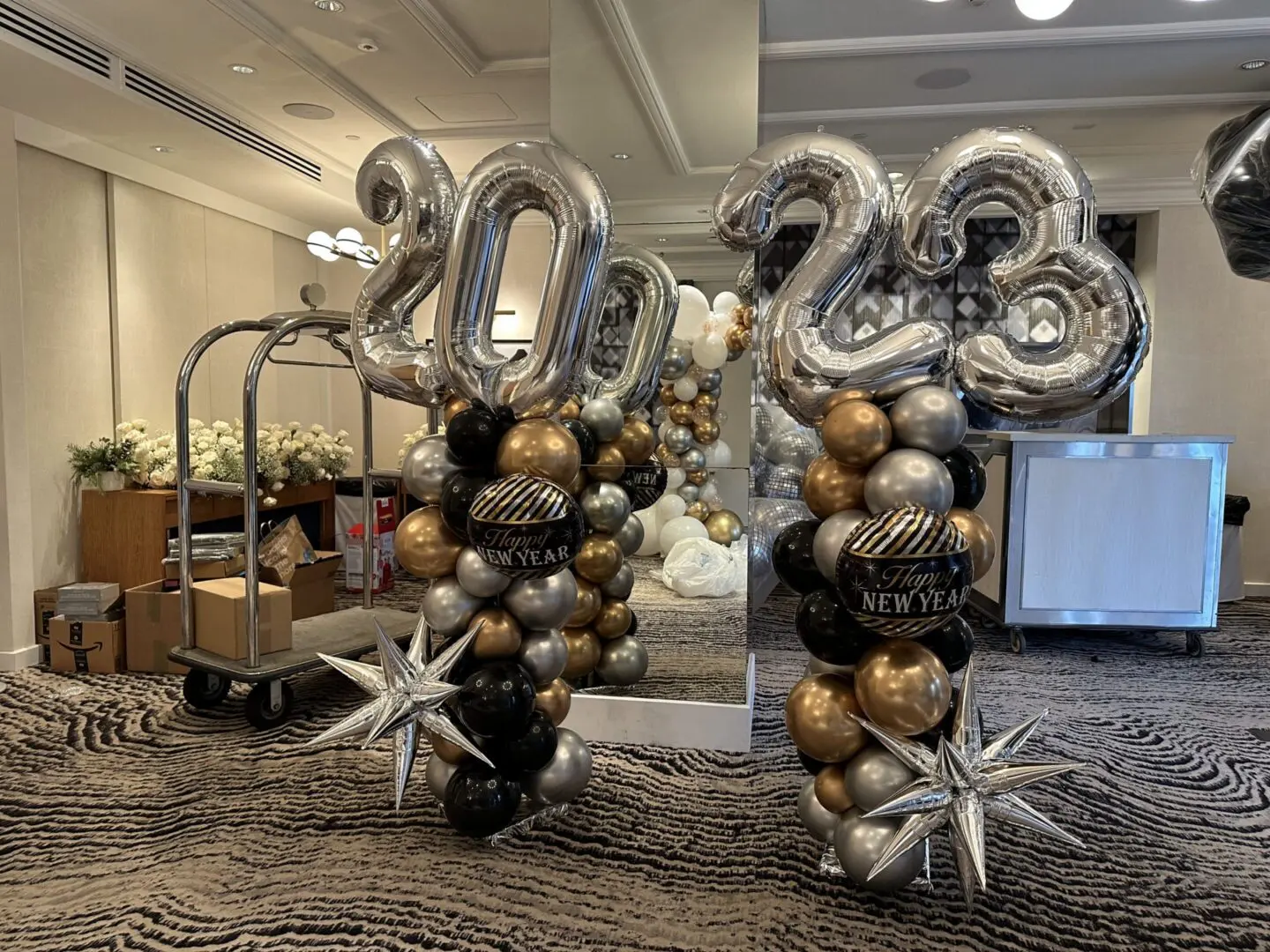 2023 silver and gold New Year balloon columns
