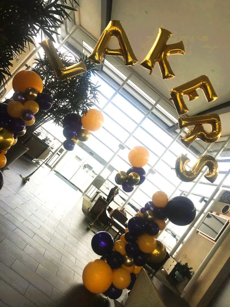 Purple and gold Lakers balloon display