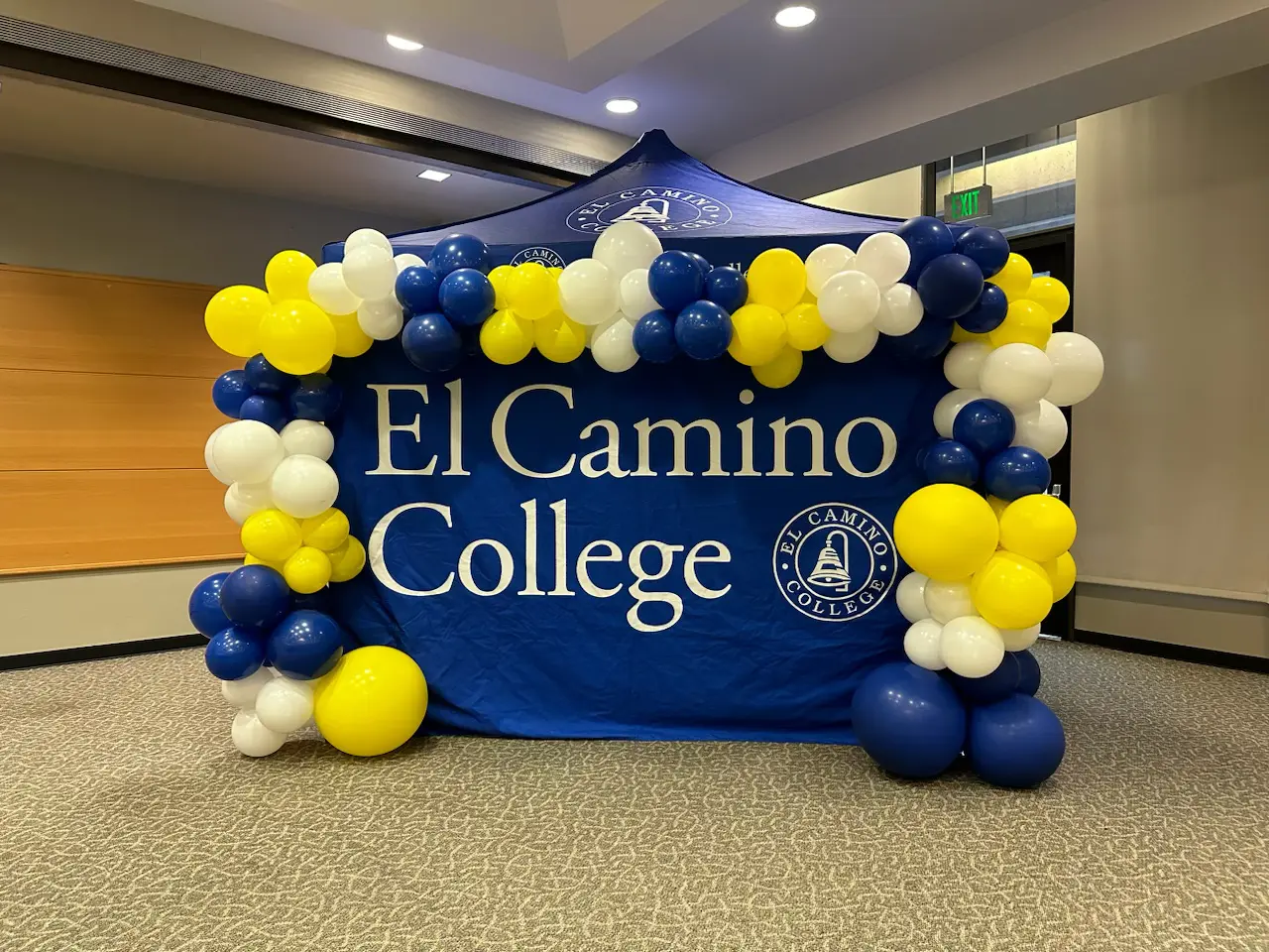 El Camino College tent with balloons